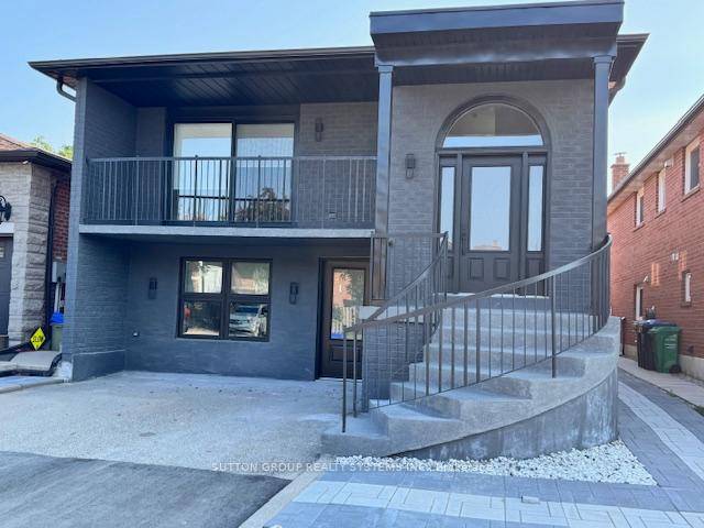 Discover The Epitome Of Upscale Living In This Meticulously Renovated Main Floor Unit, Nestled Within A Serene Low Rise Building Comprising Just Two Exclusive Residences.