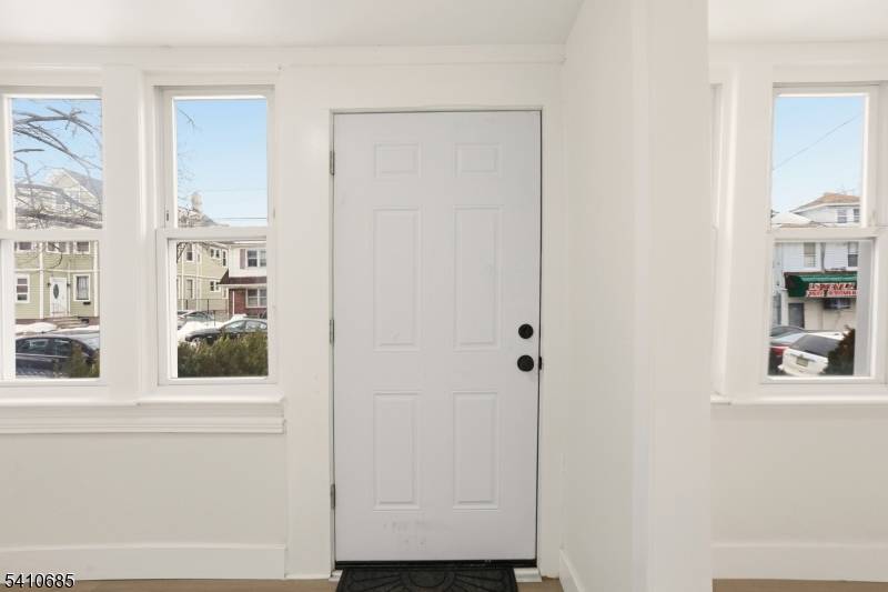 Welcome to 338 E 19th St, a beautifully renovated Colonial offering modern upgrades, comfortable living space, and a functional layout in Paterson.