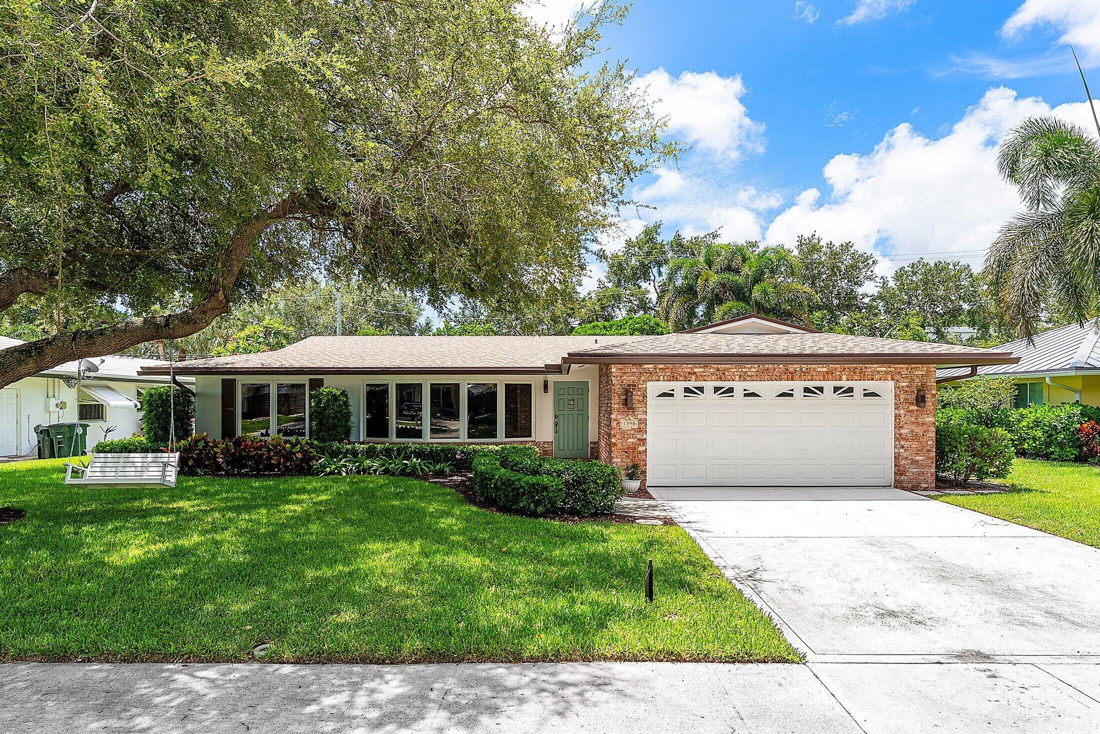 Beautifully updated 4 bedroom home in East Boca's Addison Mizner School District !