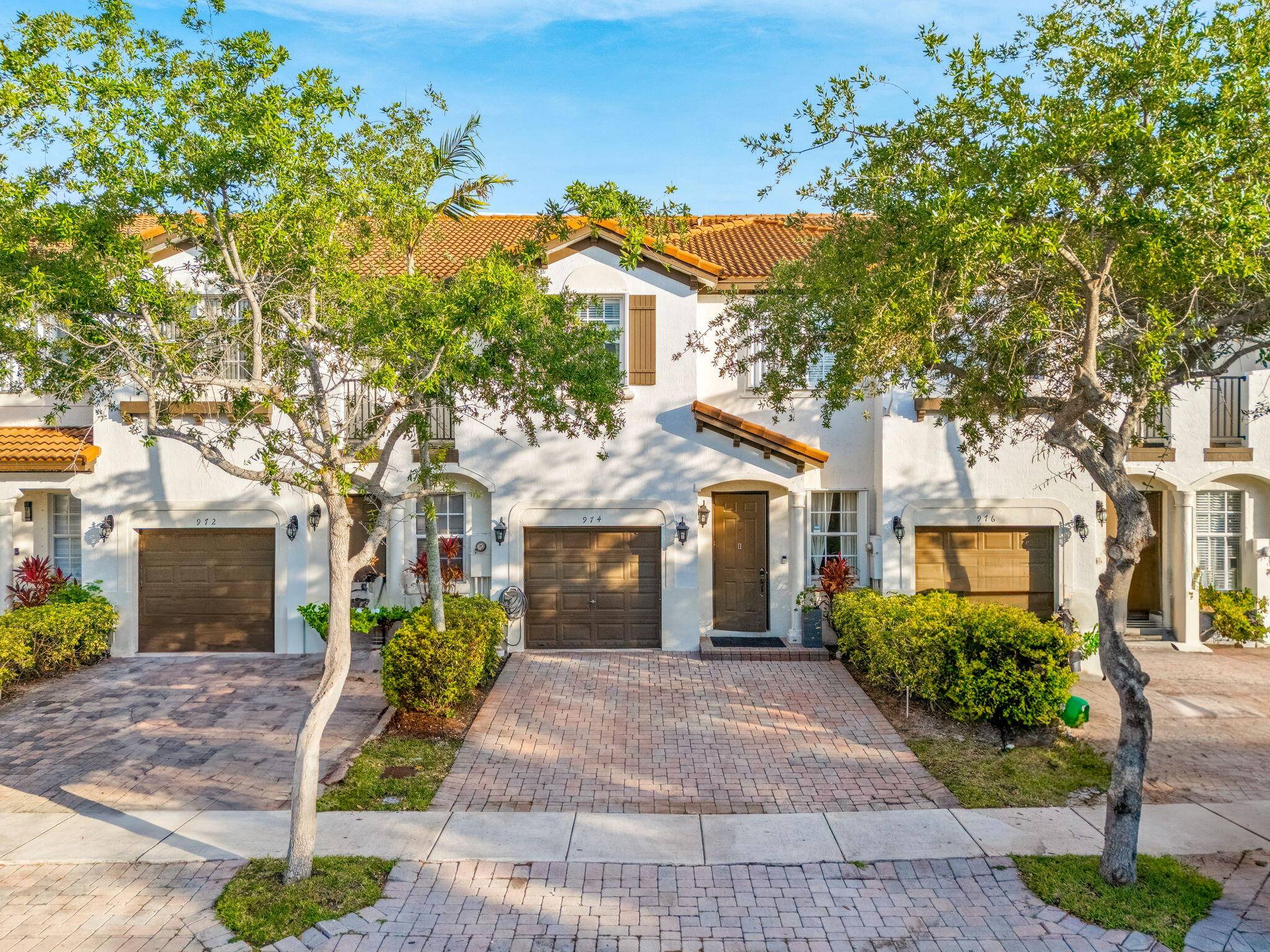 Welcome to 974 NE 29th Terrace in the gated Villas of Portofino East !