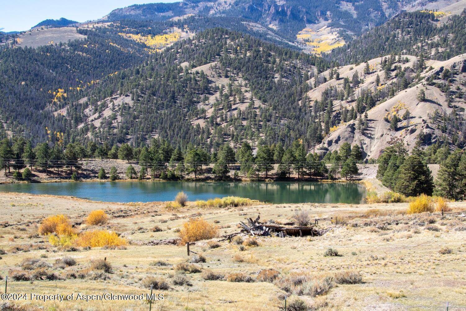 Lake Fork River Ranch, a place where anglers gently wade as elk proclaim their autumn tide serenade.