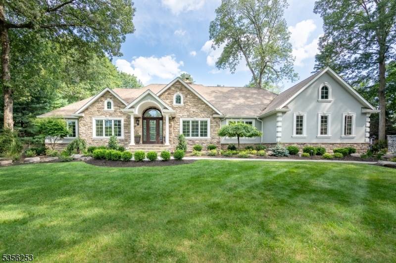 Discover this luxury ranch nestled on a tranquil cul de sac in prestigious Pines Lakes section of Wayne.