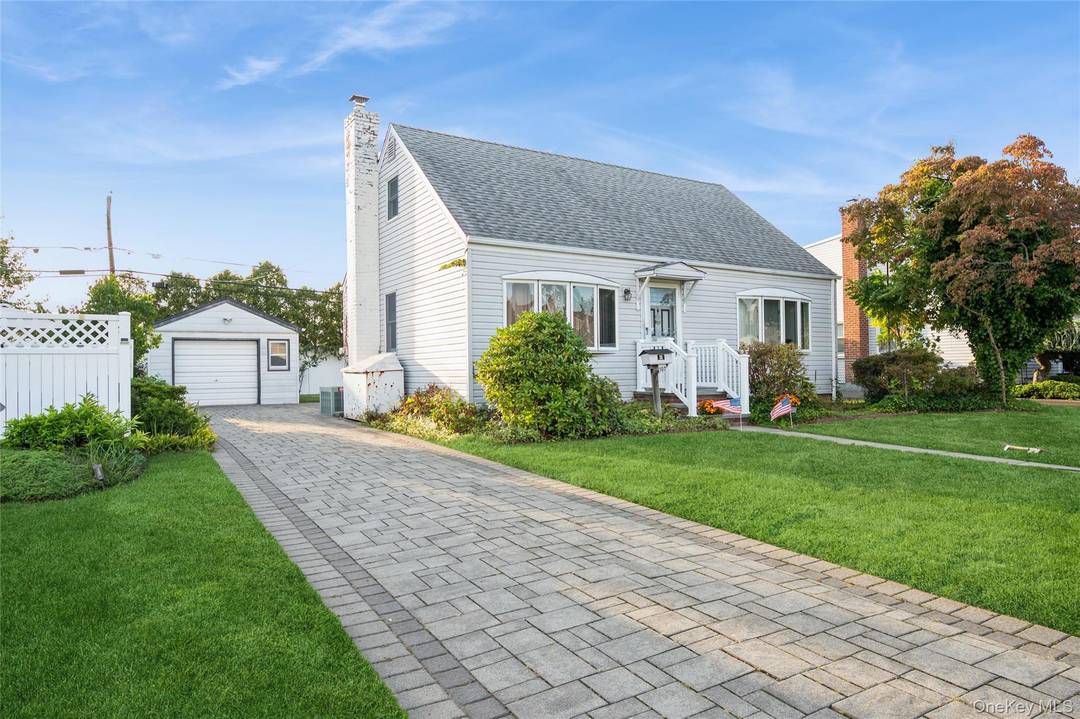 Full Basement in this MILLER CAPE with Out Side Entrance !