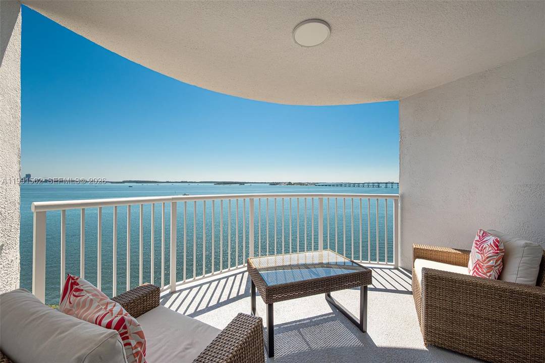Spectacular waterfront corner residence on the 10th floor offering stunning 180 degrees unobstructed water views.