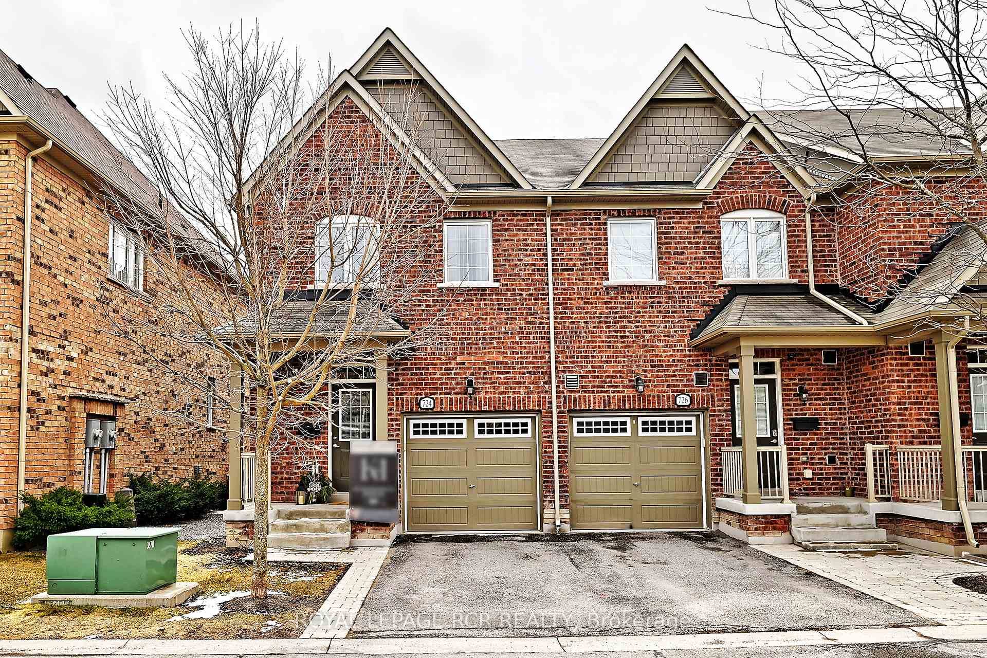 Welcome to this beautifully maintained condo townhome in Newmarkets Stonehaven Wyndham community, backing directly onto St.