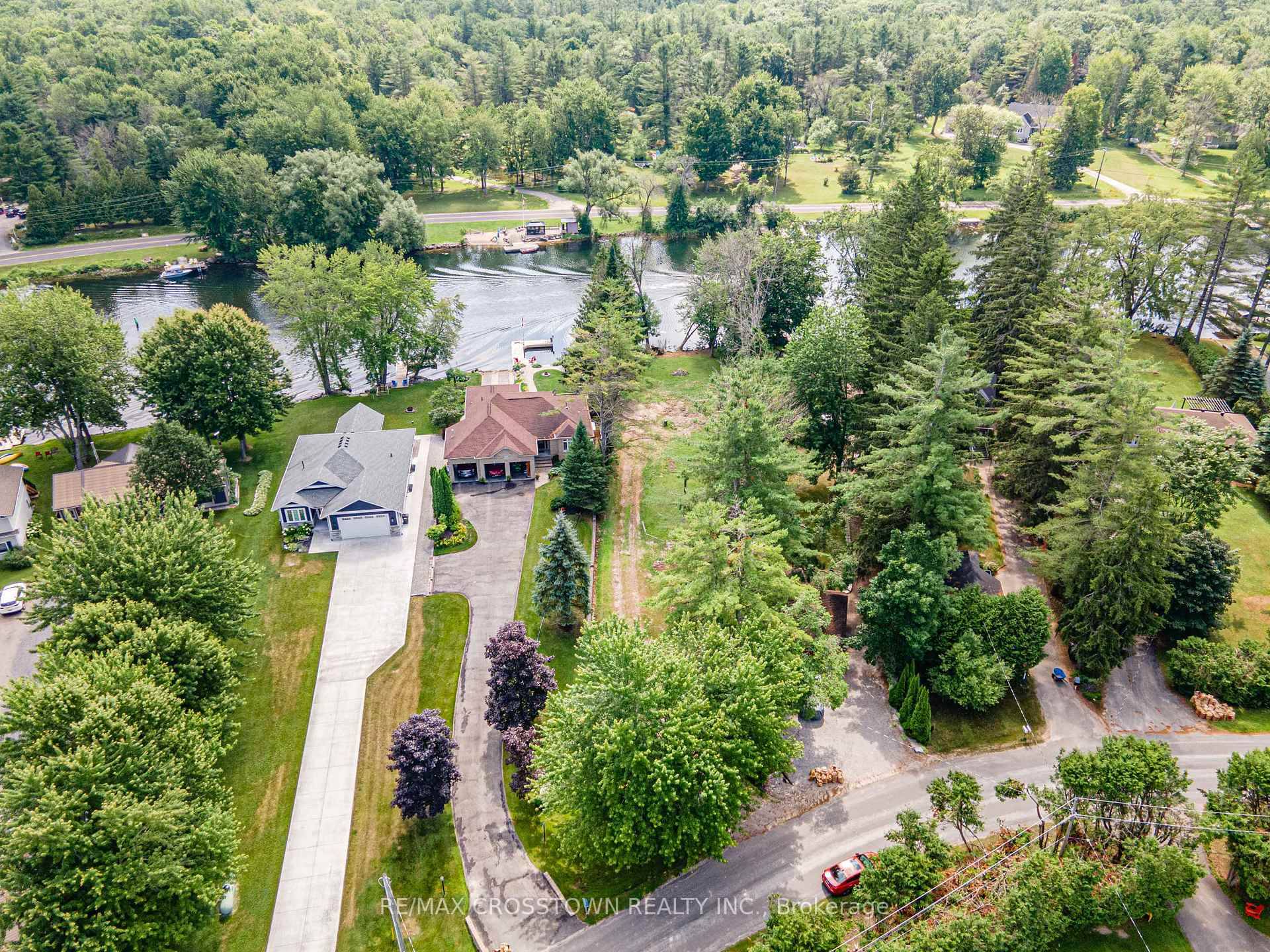 Discover the perfect canvas for your future on this stunning vacant waterfront lot in the sought after Peninsula Point community.