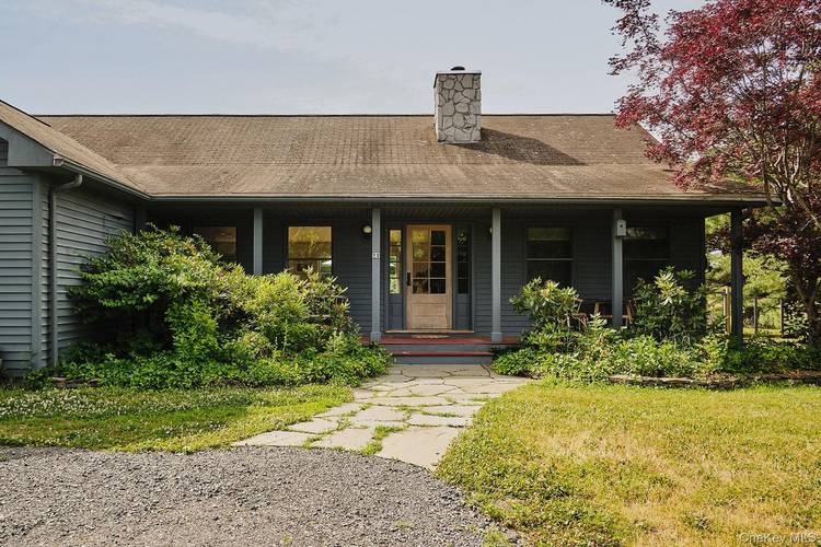 Welcome to this sun filled contemporary ranch nestled on 9 private acres in Germantown less than 1 mile from Main Street.
