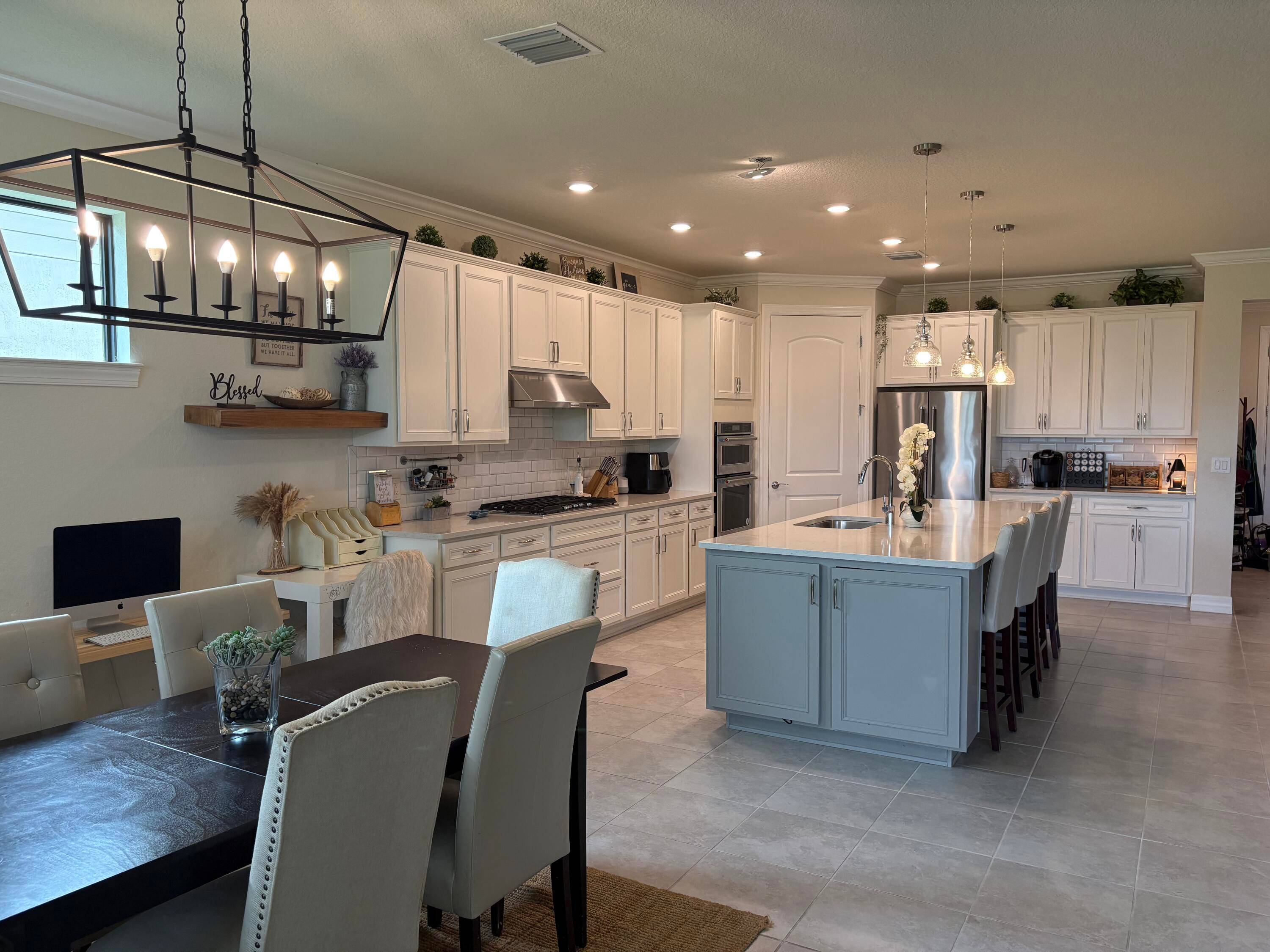 Step into elegance and comfort in this beautifully maintained 3 bedroom, 3 bathroom Den, 3 car garage, Pinnacle Model home located in the desirable Veranda Gardens Community.