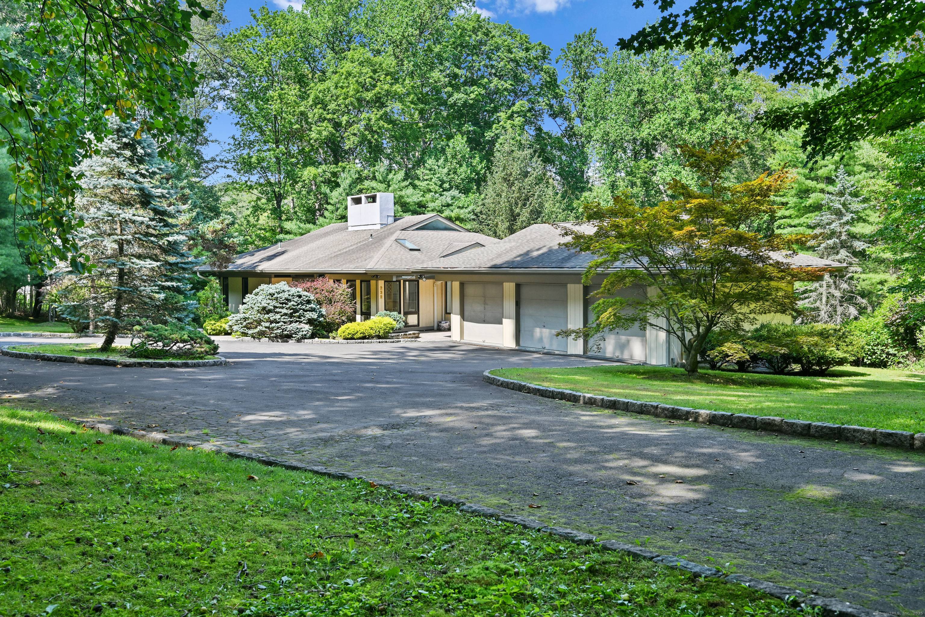 Tucked away at the end of a quiet cul de sac, this contemporary home offers nearly 4, 500sq ft of light filled living space with a flexible floorplan designed for ...