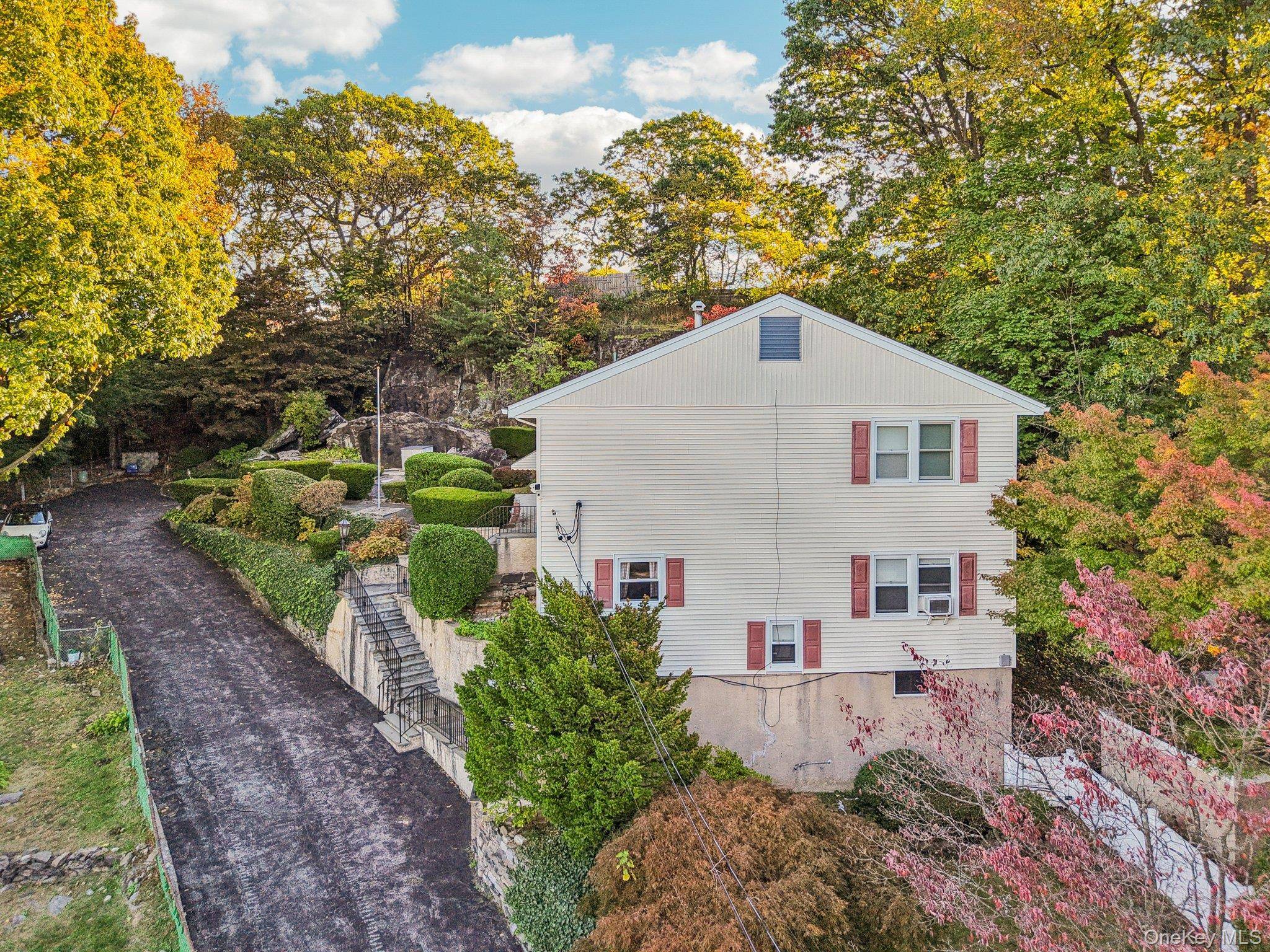 Exceptional pristine two family home built on a nearly 1 2 acre site fully fenced in with hard to find privacy with Hudson River Views and secluded backyard offering amazing ...