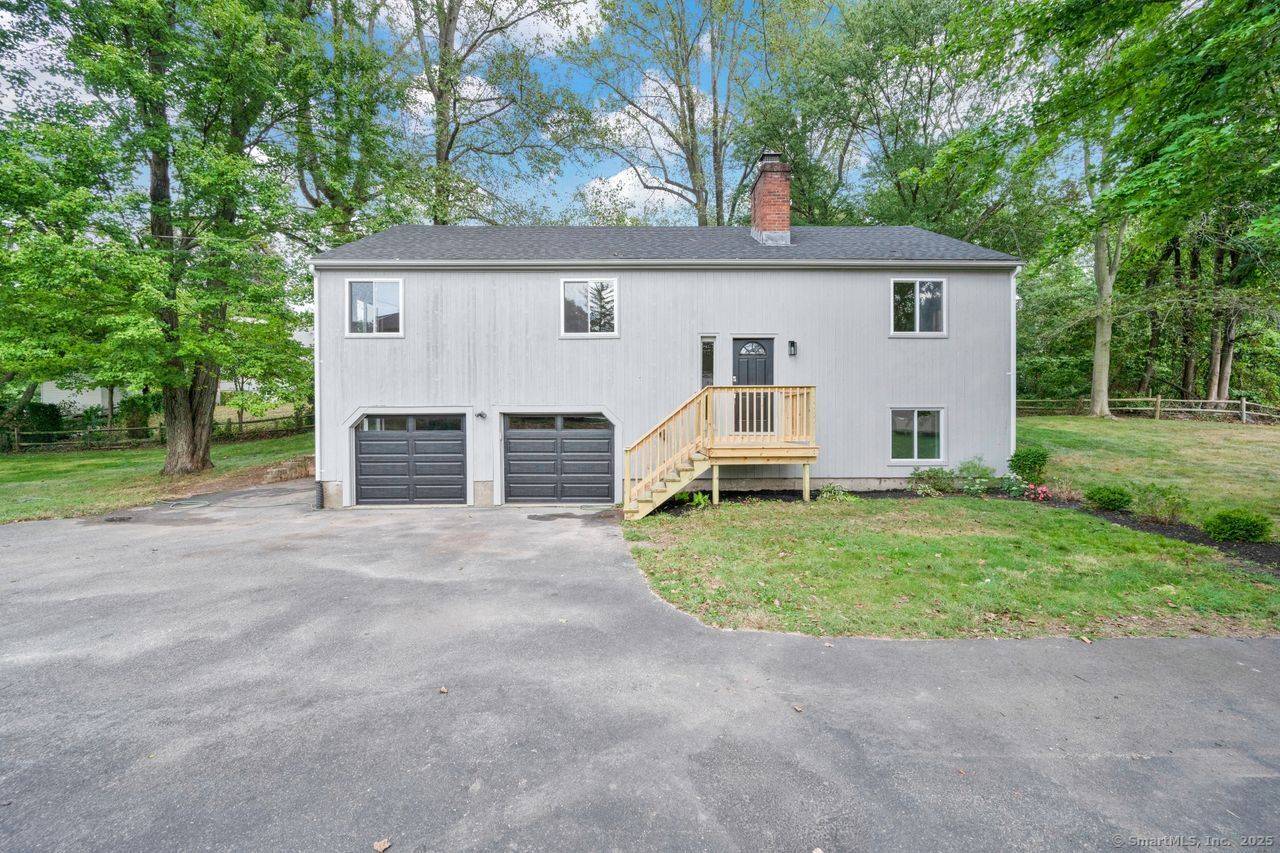 Tucked away by serene Mondo Pond, this home offers a tranquil escape with beautifully remodeled charm and is also conveniently located.