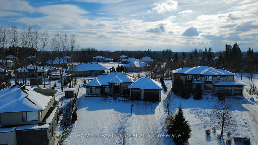 Welcome to this stunning custom built bungalow in Manotick Estates, offering 5 bedrooms, 4 baths, ALL spacious rooms flooded with natural light.