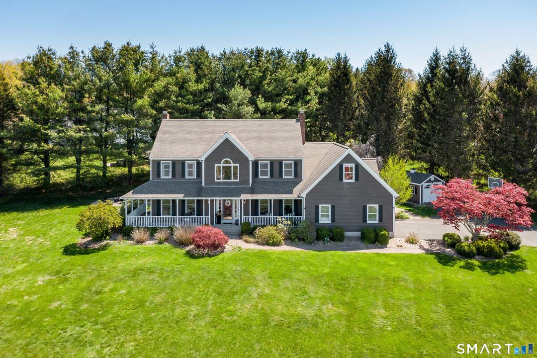 Sip lemonade on your wrap around front porch while enjoying the distant mountain views in this sought after neighborhood.