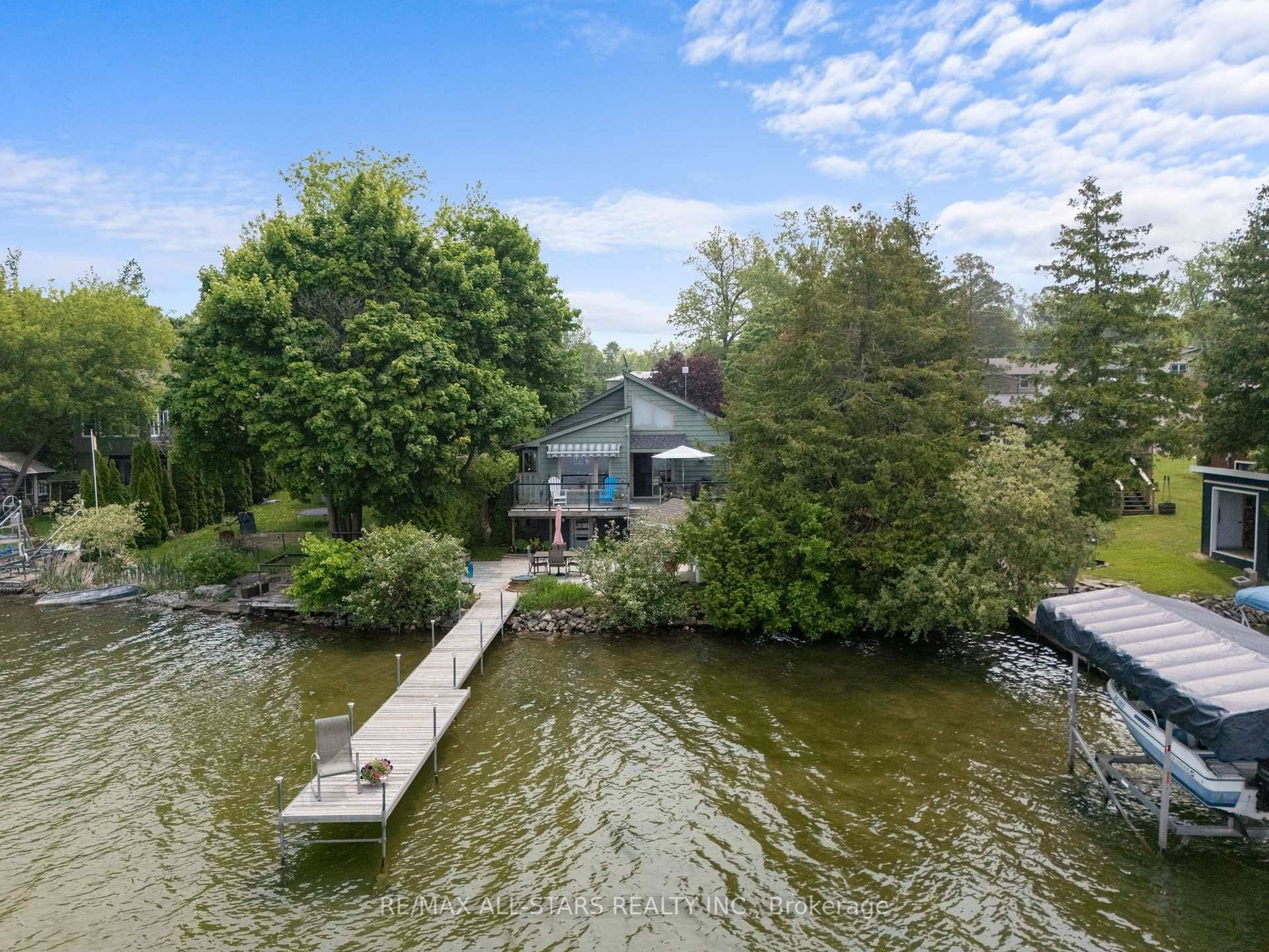 Exceptional waterfront property nestled along a quiet meandering lakeside street in a friendly neighbourhood within an easy commute to urban areas in Durham amp ; Kawartha Regions amp ; the ...