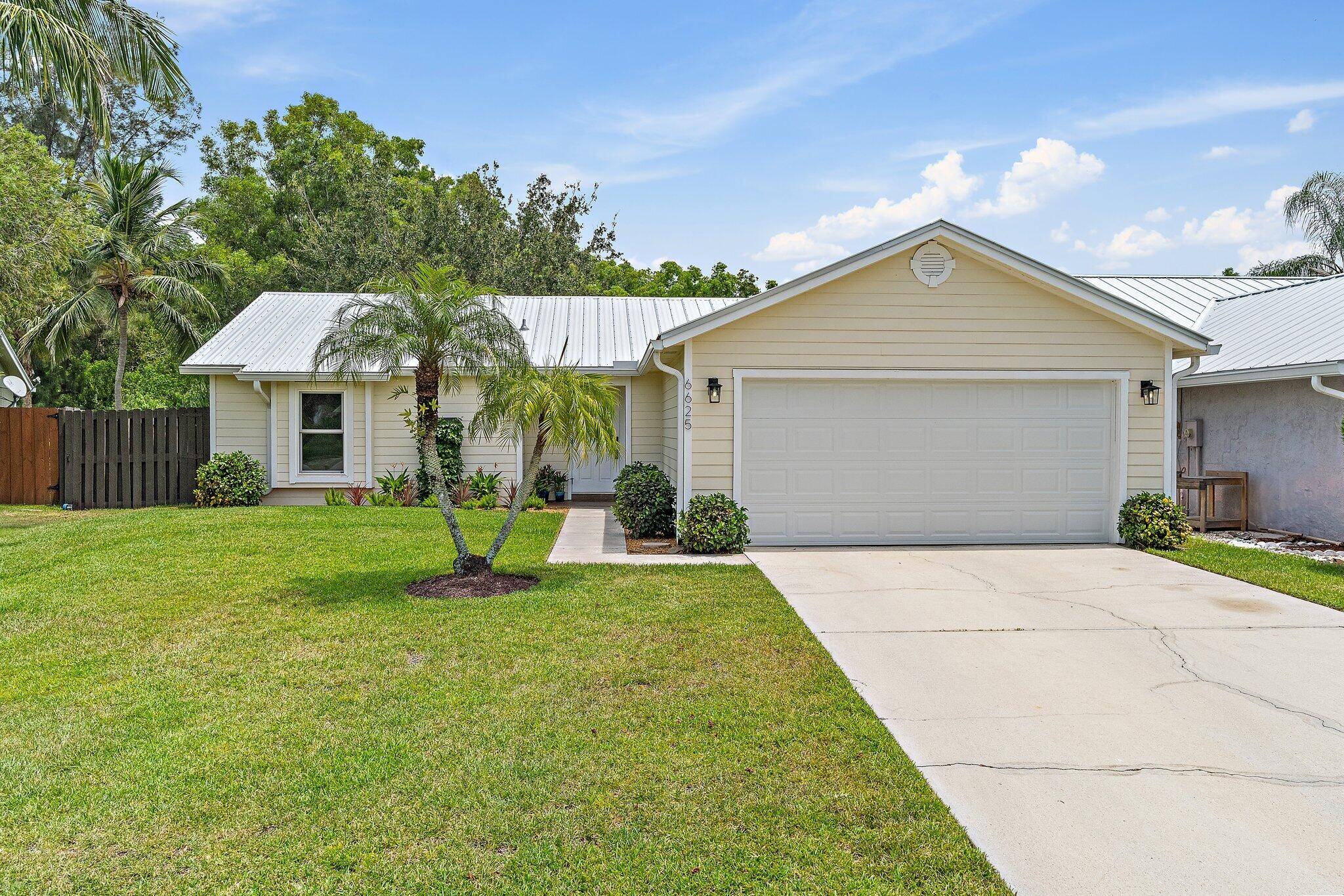 Welcome to your dream home at 6625 SE Amyris Ct in Stuart, FL !