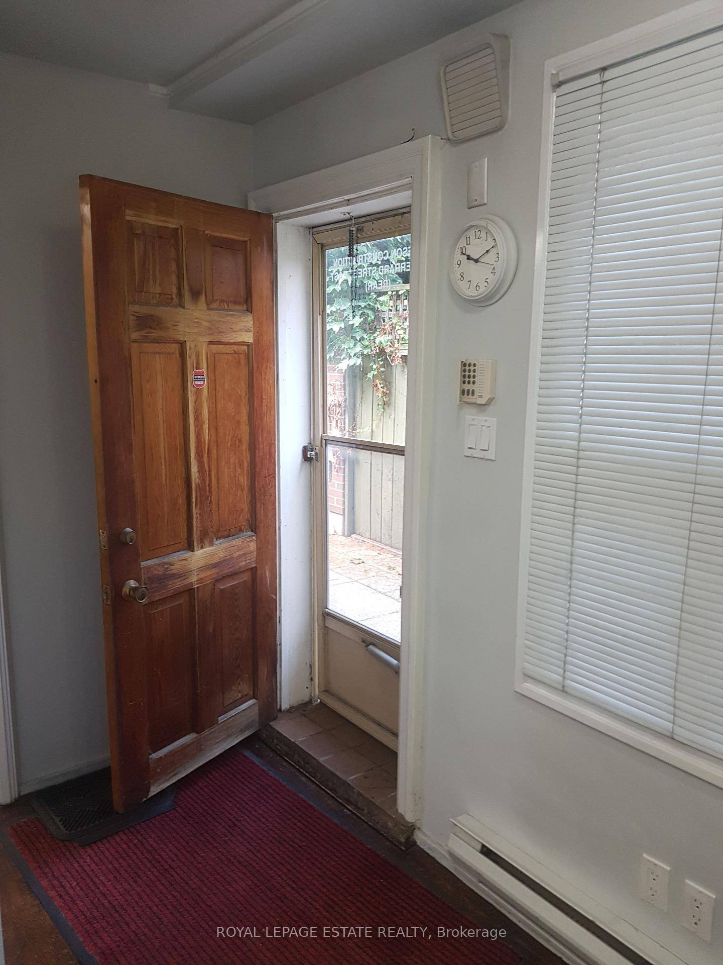 Well appointed lower level commercial space with separate street level entrance perfect for private office use, professional services, or studio space.