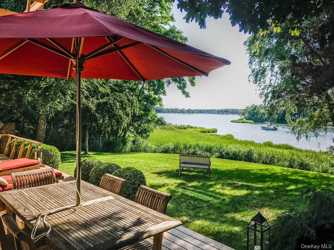 Stunning Waterfront Retreat with Panoramic Views amp ; Dock Access Wake up to breathtaking water views from every window in this beautifully appointed North Sea Harbor home.