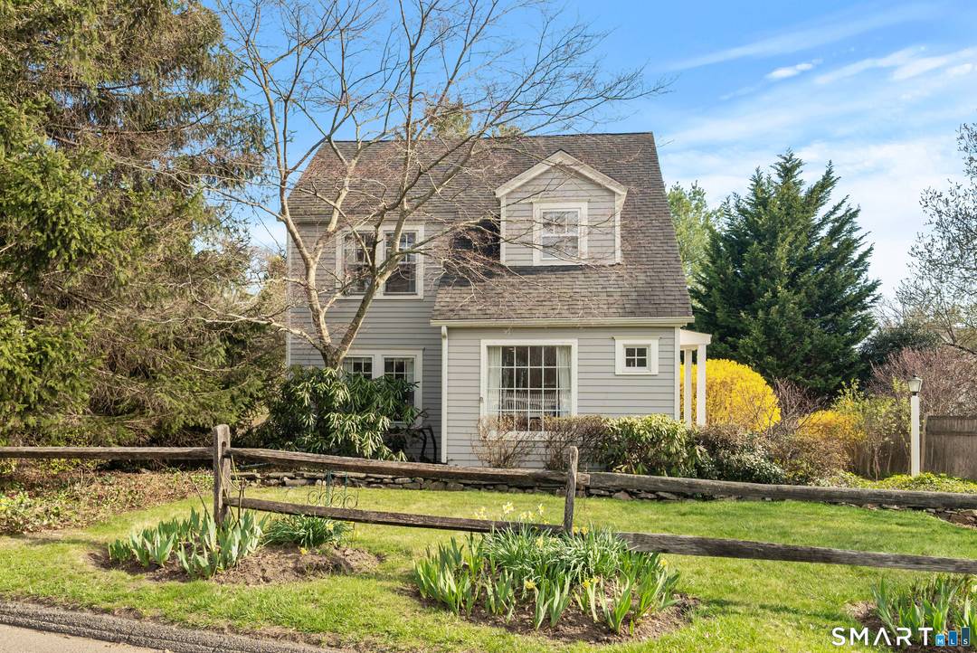 Charming and full of character, this three bedroom, two and a half bath home offers timeless appeal in an unbeatable Rowayton location.