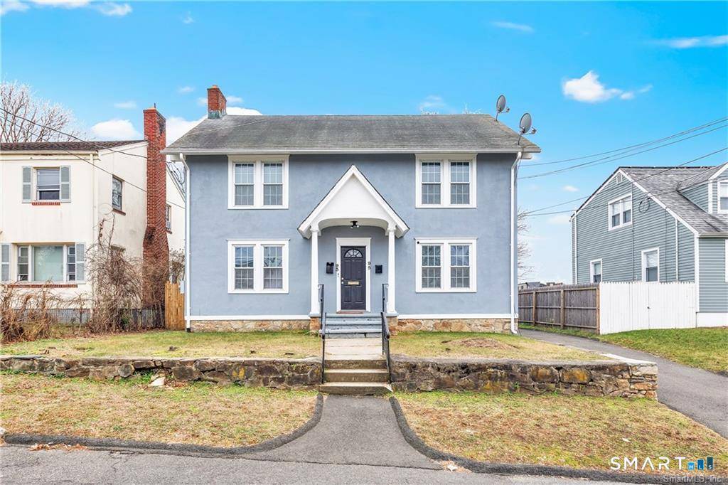 Bright and updated two family home offering versatility and income potential.