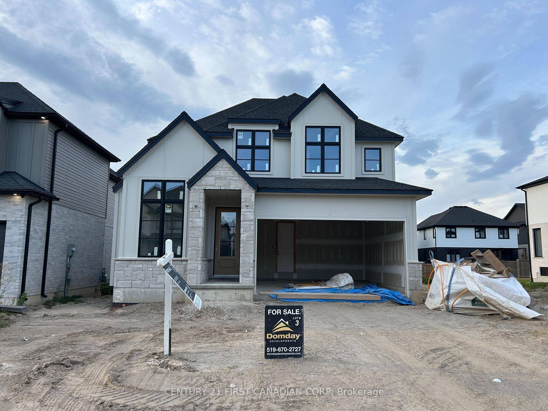 BONUS Separate side entrance to the finished lower level offers excellent rental or in law suite potential.