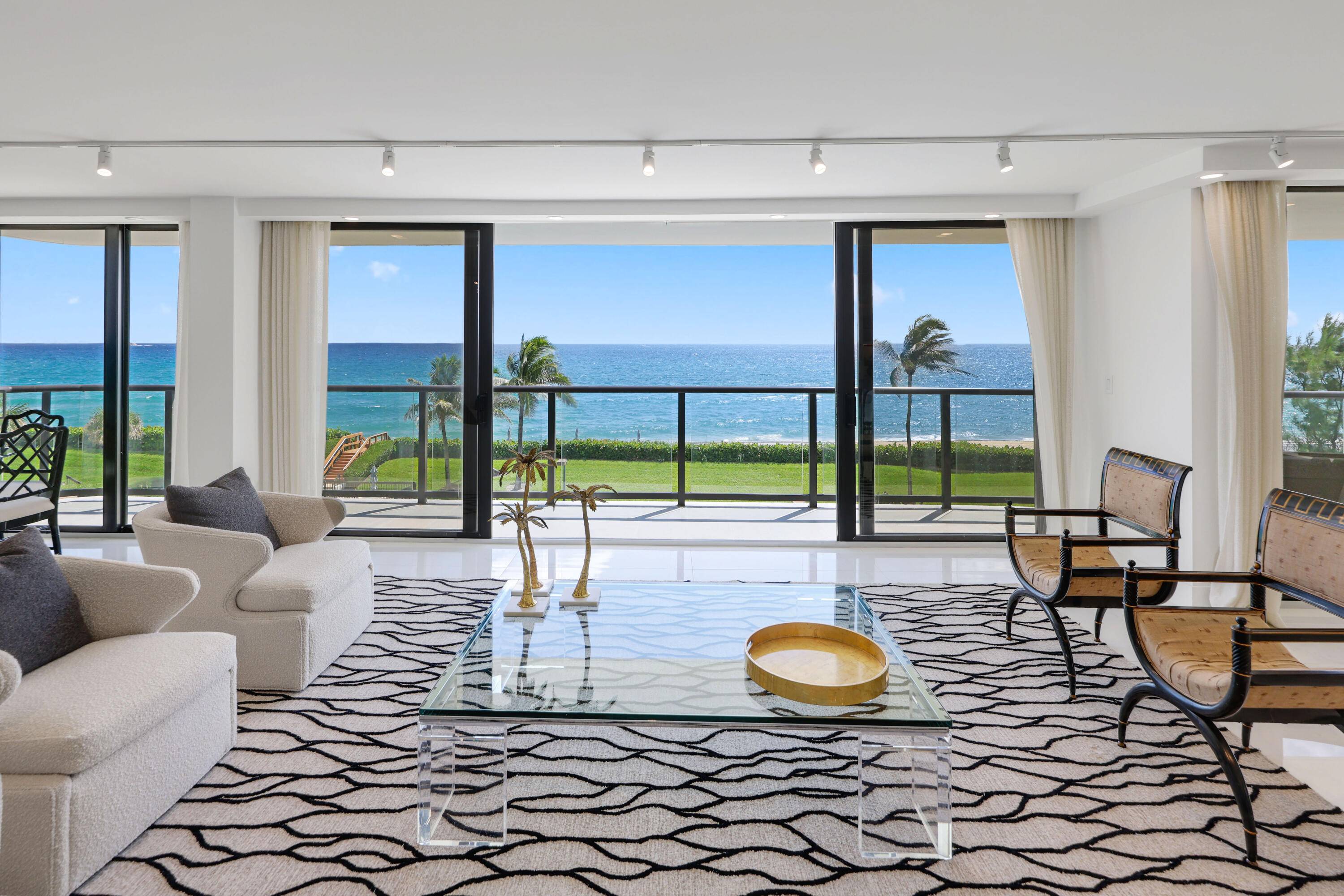 Direct Oceanfront, Completely Renovated, Panoramic ocean views, a wraparound terrace, effortless beach access, a private oceanfront cabana define this furnished home.