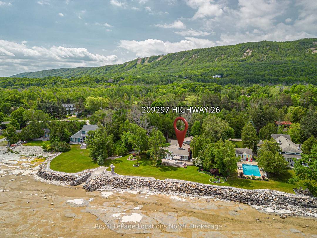 Welcome to a truly exceptional waterfront property in the coveted Wards Road area of Craigleith, where breathtaking views of Georgian Bay meet the ultimate in privacy and location.