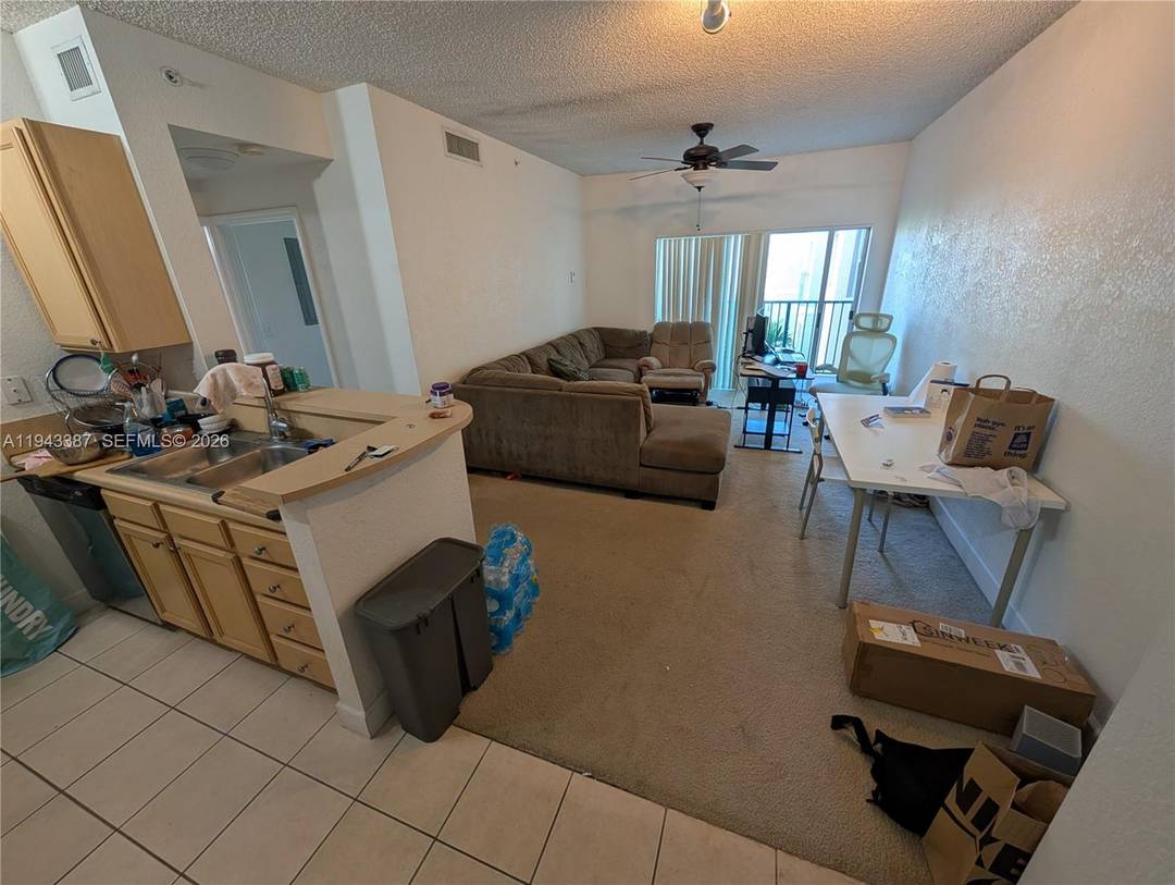 Roomy 1 1, Includes 1 parking space, building has 24 7 security, on site management, pool, billiards, clubhouse, gym and more.