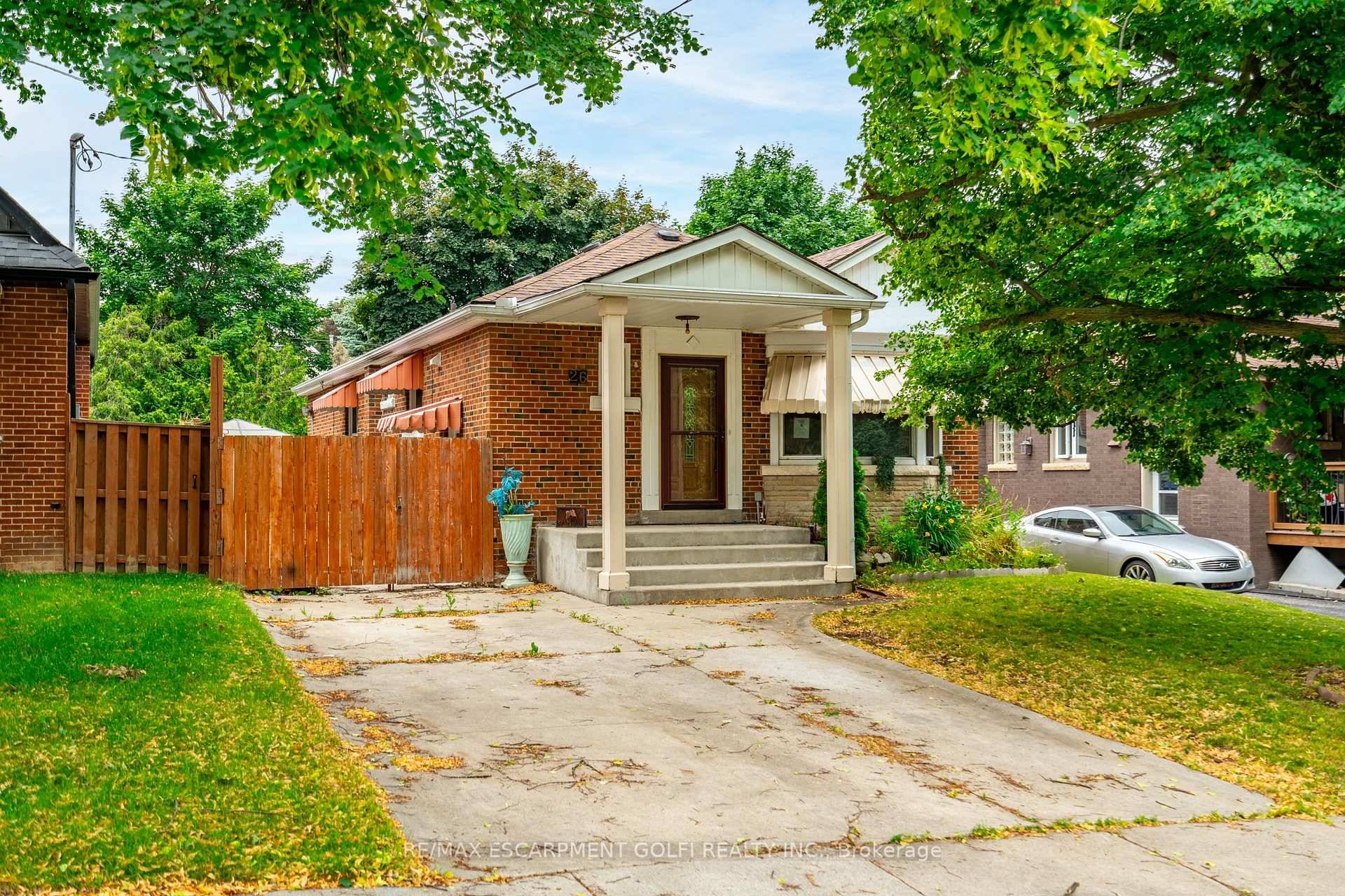 FANTASTIC OPPORTUNITY ! ALL BRICK BUNGALOW WITH SEPARATE SIDE ENTRANCE IN HIGHLY SOUGHT AFTER ROSEDALE NEIGHBORHOOD !