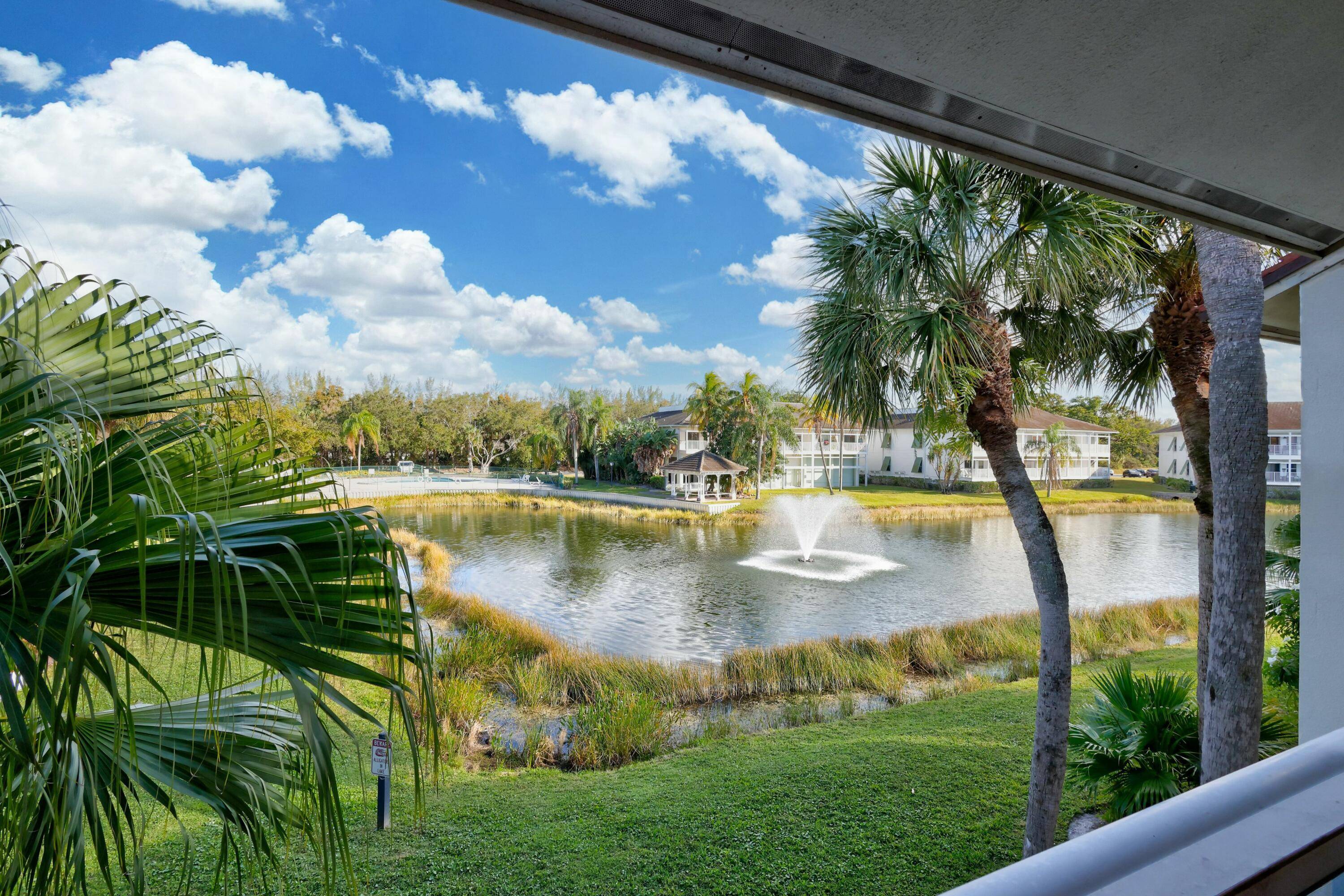 Located in the gated community of PGA National, this fully furnished 2 bedroom, 2 bathroom condo offers lake views, vaulted ceilings, and a screened in patio just steps from the ...