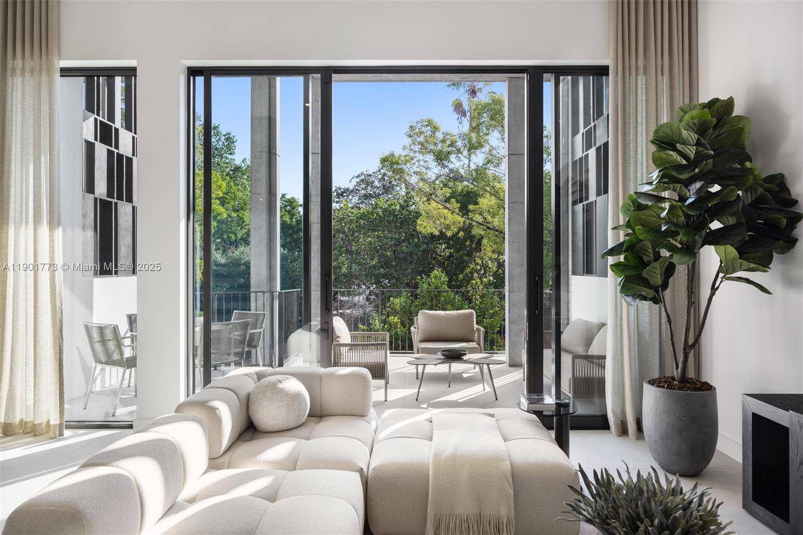 Award winning contemporary residence in The Roads Townhomes featuring a distinctive formed concrete fac ade.