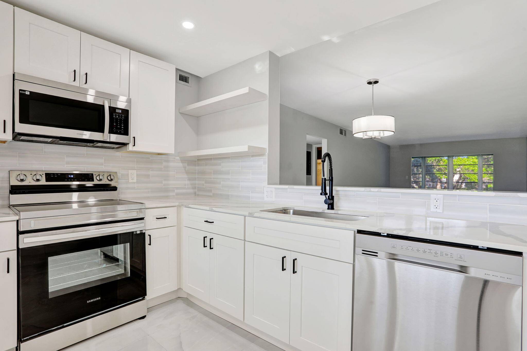 FULLY RENOVATED 2 Bedroom Condo in the Heart of Wynmoor !