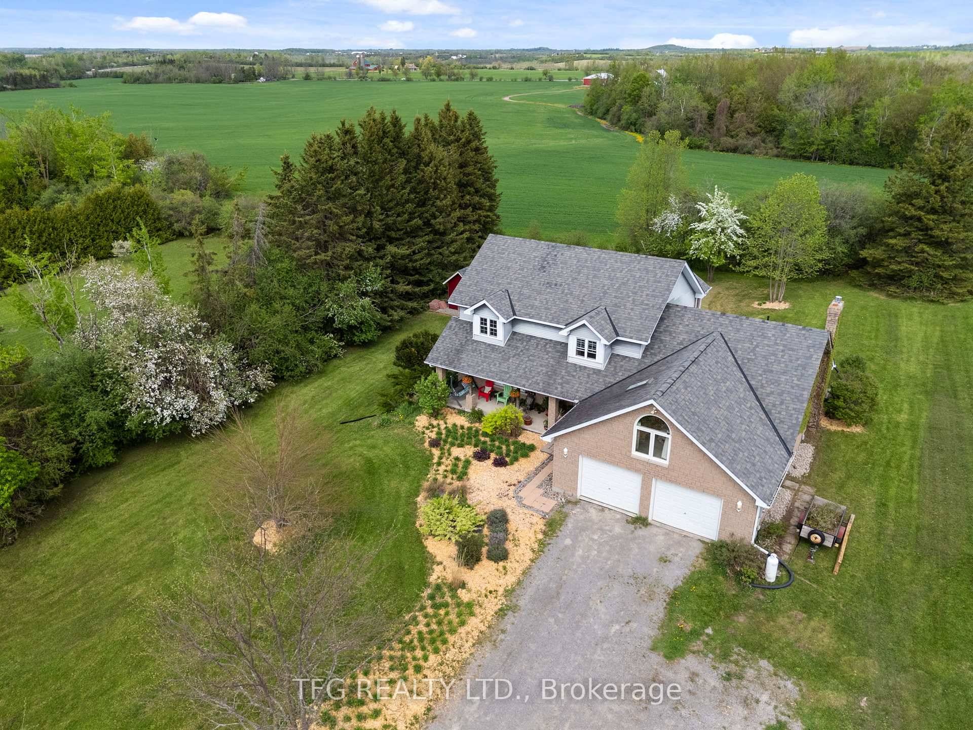 Set back at the end of a long winding driveway atop a hill sits this expansive family home w incredible views on 1.