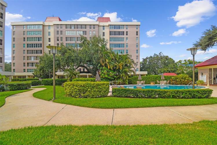 Enjoy expansive views of Hillsborough Bay from this ninth floor penthouse residence in Howell Park Condominiums, a gated waterfront community for residents age 55 and older, just off Bayshore Boulevard.