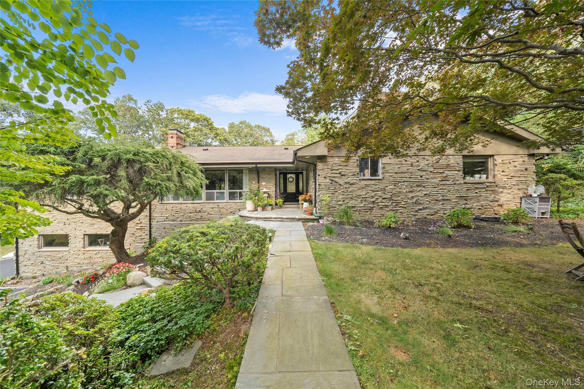 Welcome Home to this expansive ranch in the heart of Old Westbury, located within the Jericho School District !