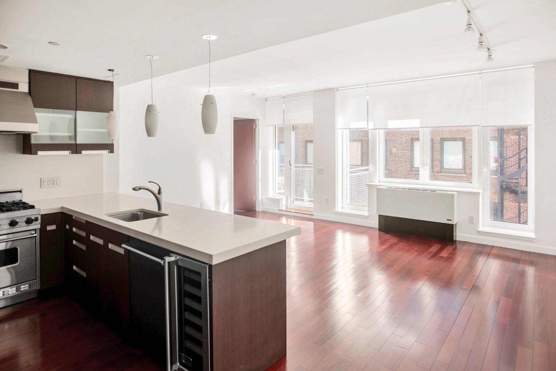 Perched on the 11th floor in the heart of Chelsea, this oversized one bedroom and 1.