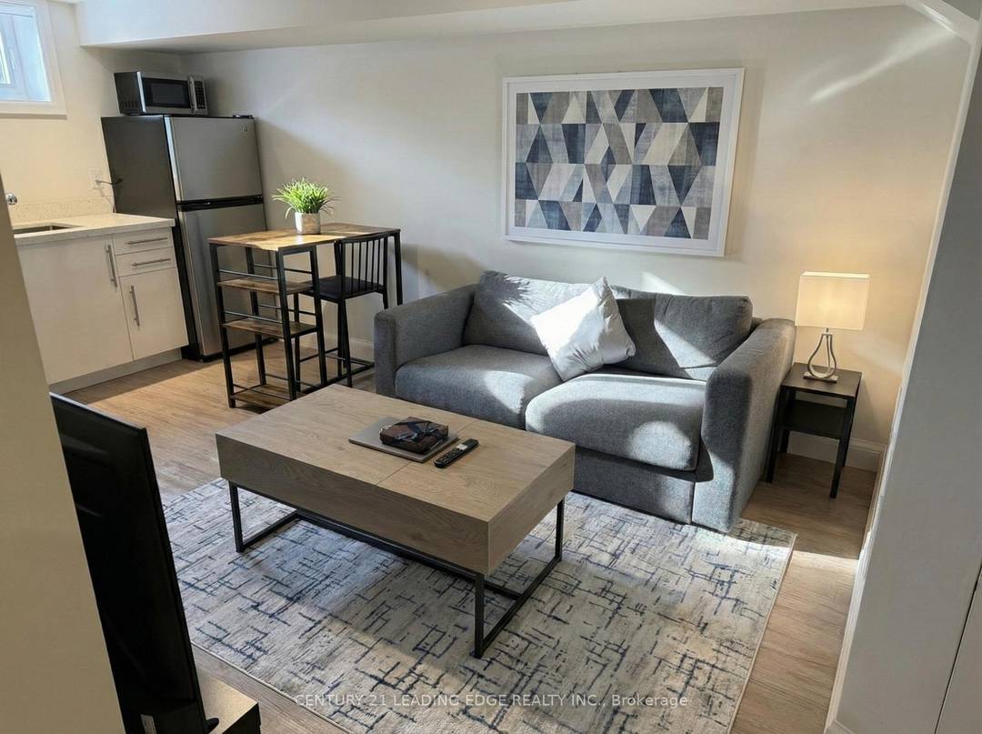 This fully renovated lower level suite is a spacious 540 sq.