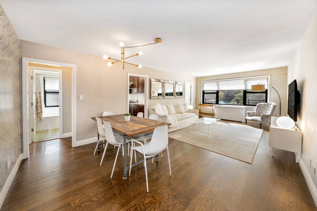 This beautifully maintained corner three bedroom, two bath cooperative welcomes you with a gracious entry foyer that immediately sets the tone for the home's scale and functionality.