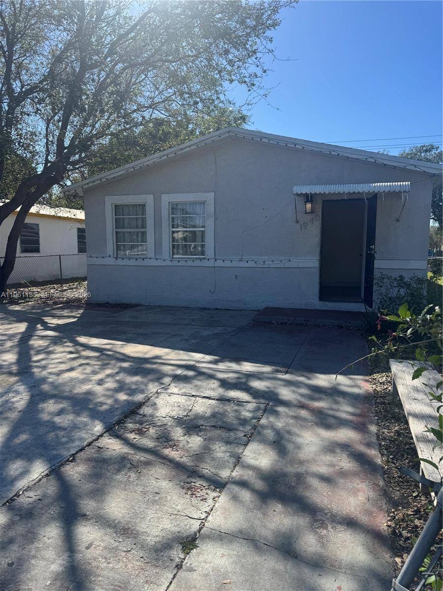 Great corner property with 4 bedrooms and 2 baths, and a huge backyard, close to schools and great for a contractor.