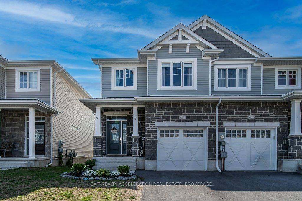 Gorgeous end unit Woodhaven townhome with 1, 750 sq ft plus unfinished lower level ready to make your own designs, with rough in for bath.