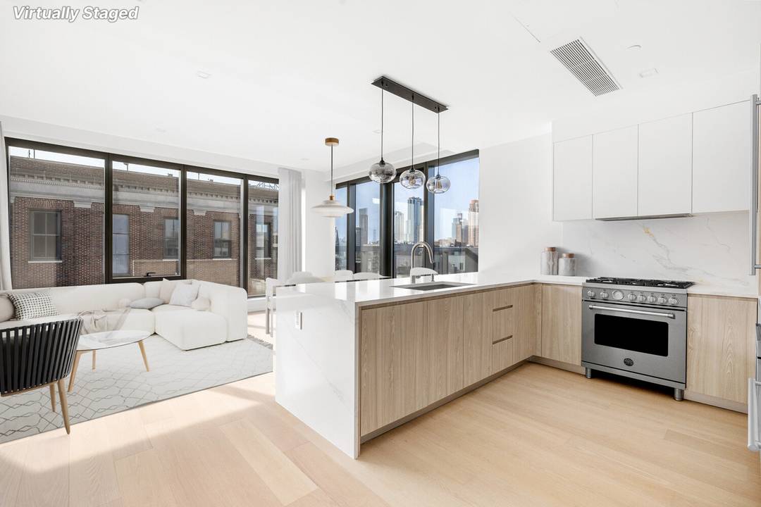Don't miss this GORGEOUS 3 bedroom and 2 bath residence with a West facing terrace with views of the Manhattan skyline !