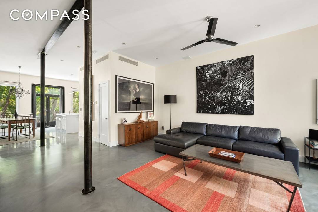 Nestled in the heart of Bedford Stuyvesant, this stunning brownstone offers an exquisite blend of modern industrial style and classic elegance.