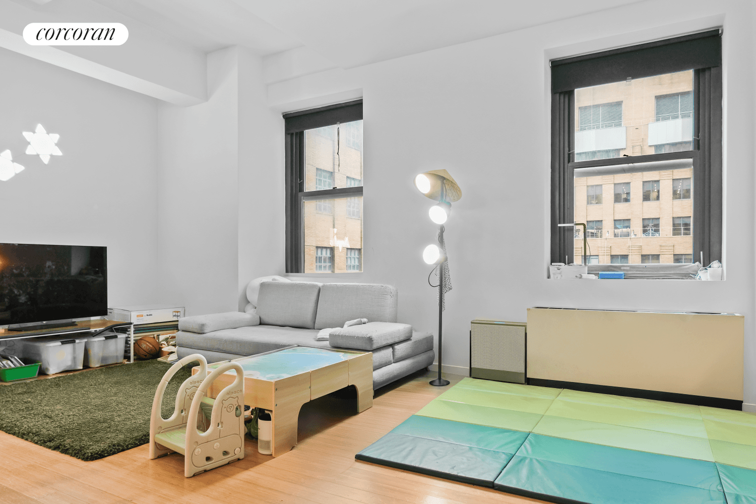 This spacious loft at 365 Bridge St, Apt 7O, offers a versatile layout with one bedroom, a large home office or nursery, and two full bathrooms.