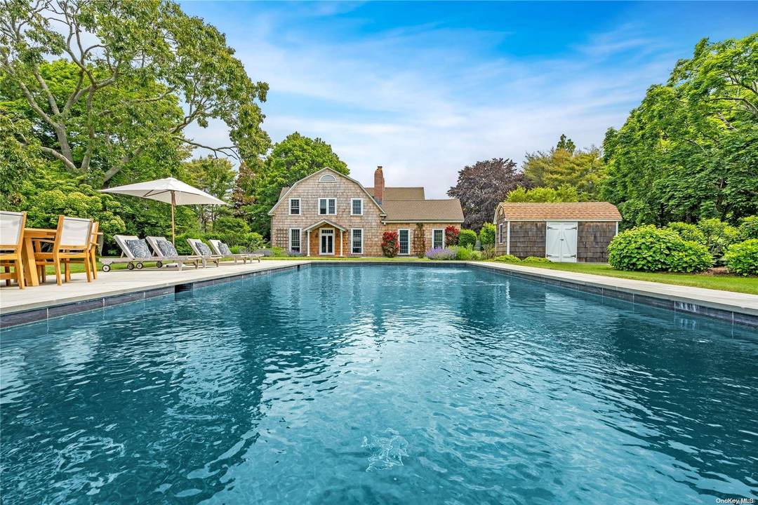 GORGEOUS QUOGUE TRADITIONAL Magnificent 4 BR 5 BA home in the Estate section of Quogue with plenty of living space.