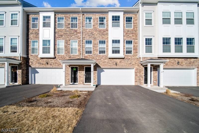 Gorgeous Newer Townhome in upscale community of Collection at Morristown with easy access to major highways, shopping and Morristown Train Station 1.