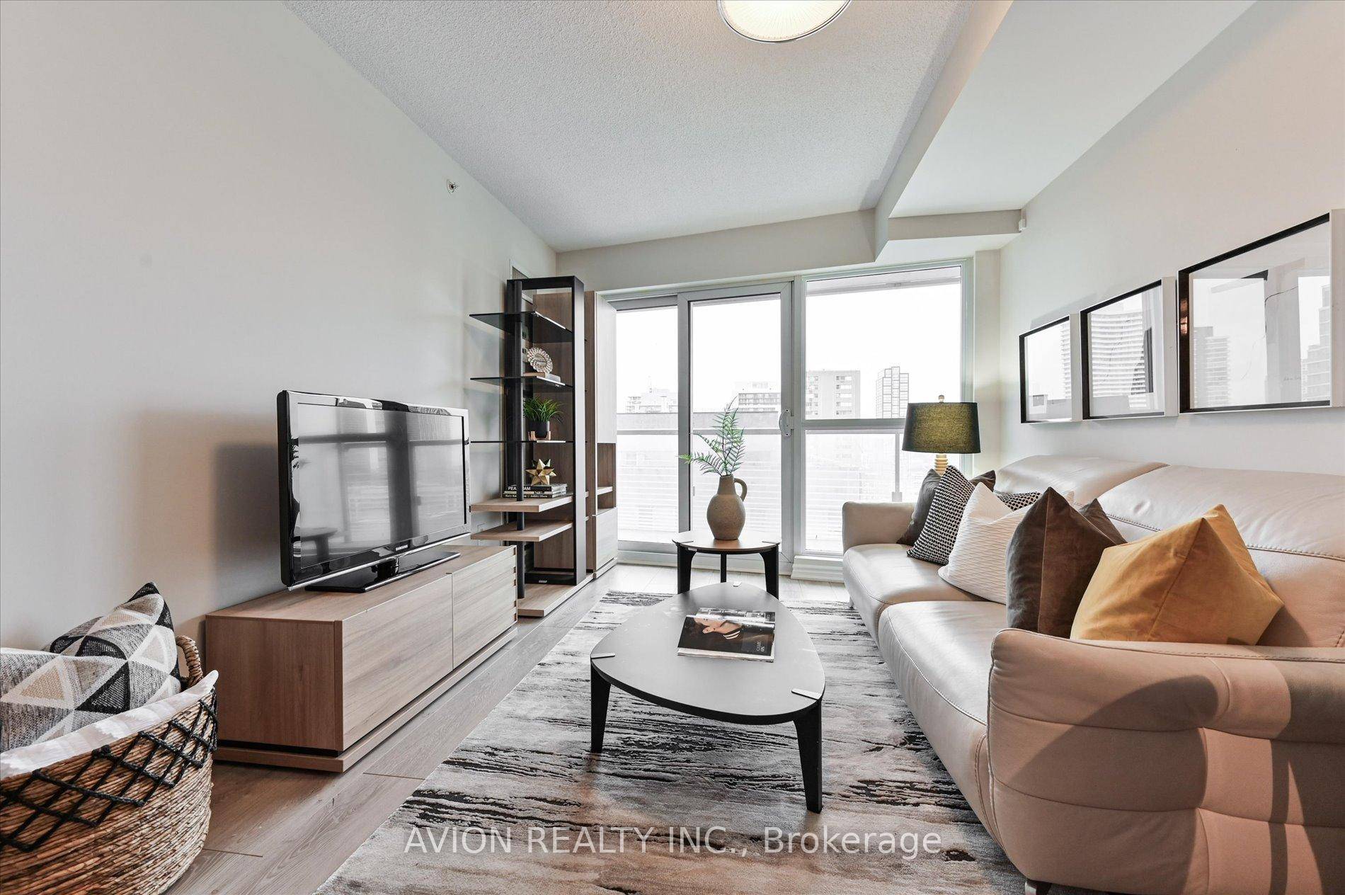Experience Luxury And Convenience In This Fully Furnished 1 Bedroom Den, 2 Bathroom Suite At Aura Condos, Offering 763 Sq.