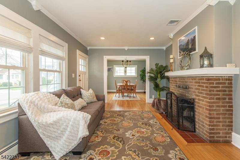 Nestled in one of West Caldwell's most loved, picturesque neighborhoods, this sun filled home blends classic charm with thoughtful updates and inviting outdoor living.