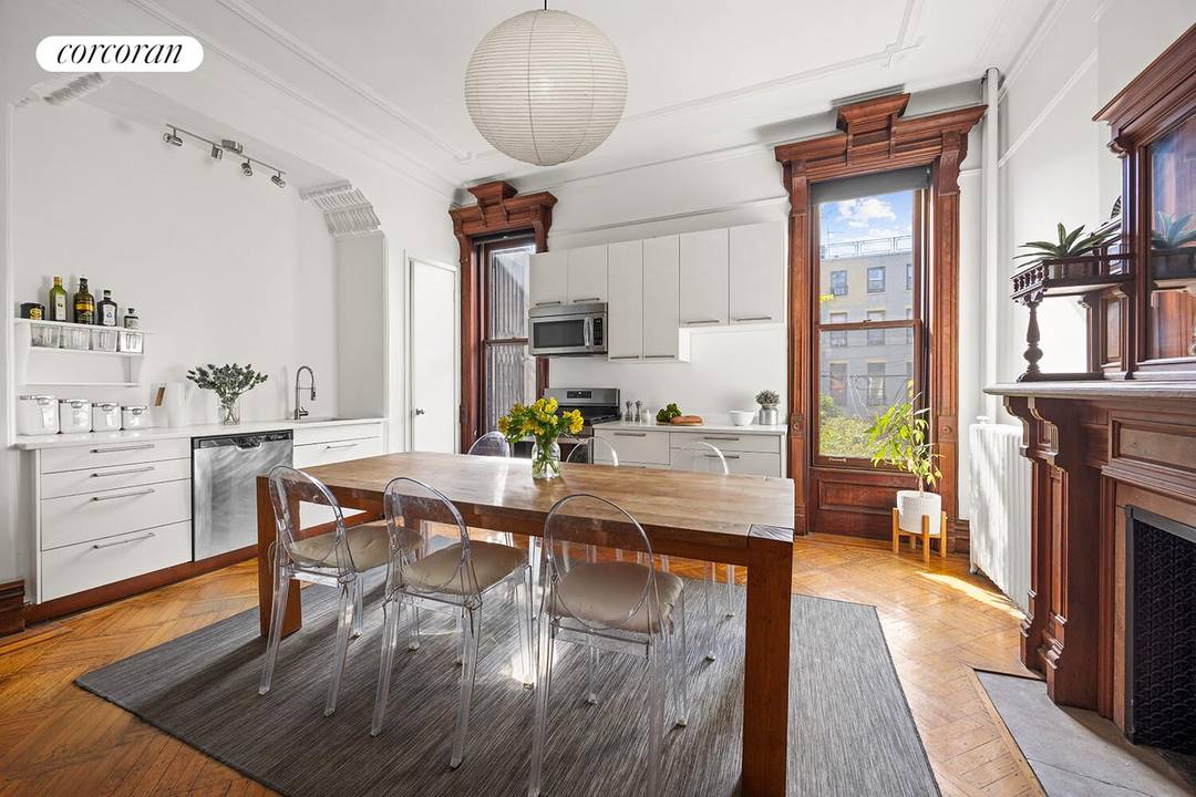 Welcome to 54 Sterling Place, a gracious four story, townhouse where historic charm meets modern convenience.