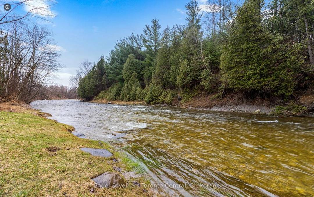 Discover a Rare Slice of Riverfront Paradise on the Edge of Creemore.