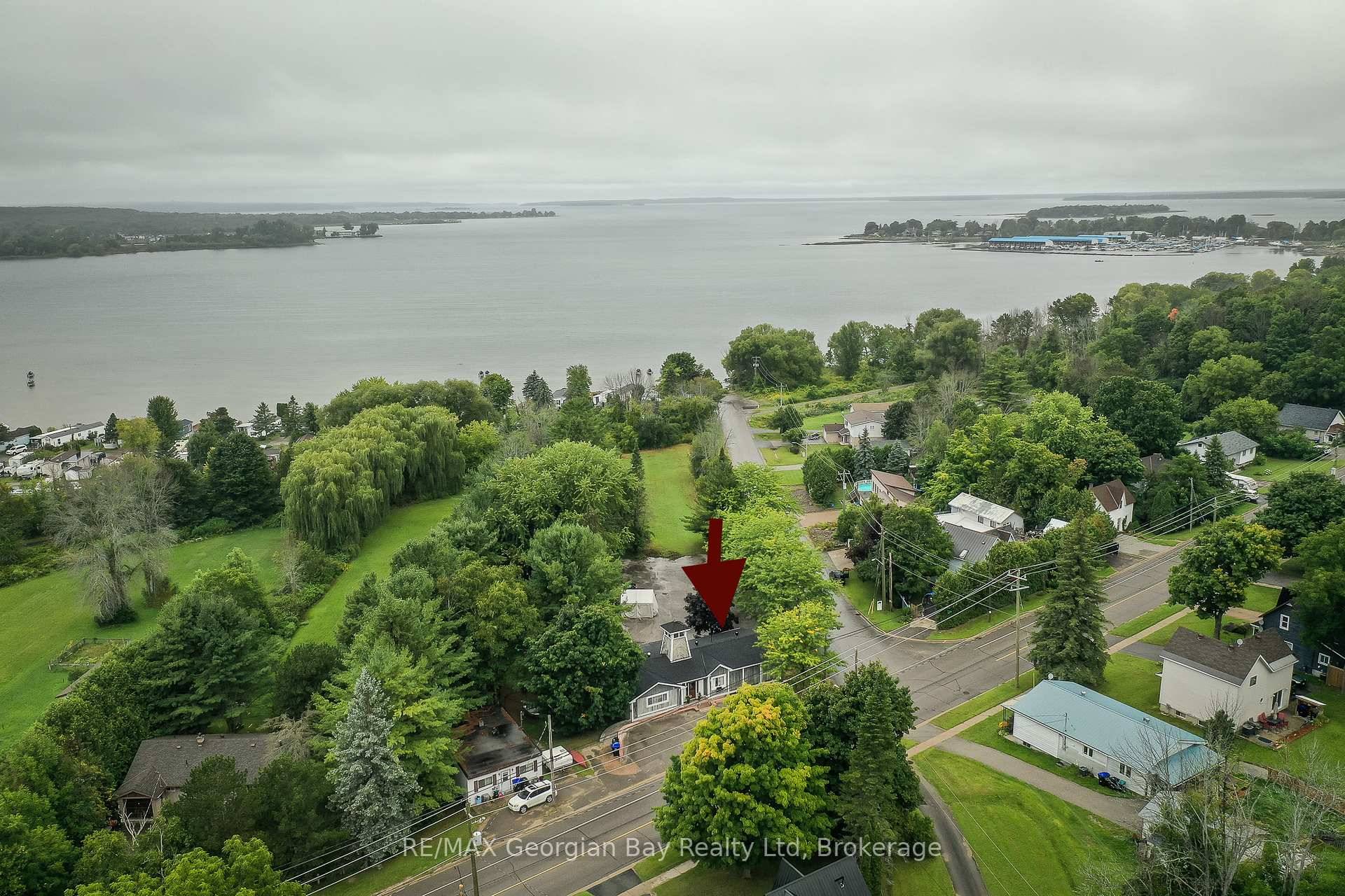Fantastic opportunity on this amazing location and C4 1 zoning permitting may uses for this spacious home on large lot almost an acre in size only steps to Georgian Bay, ...