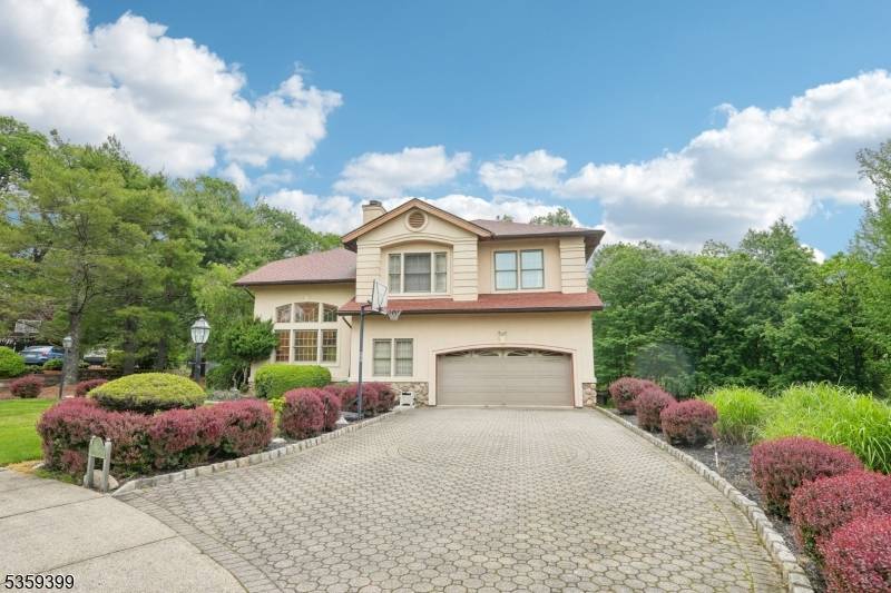 Welcome to this exquisite Center Hall Colonial, perfectly situated on a desirable cul de sac in the prestigious Dykers Farm Estates.